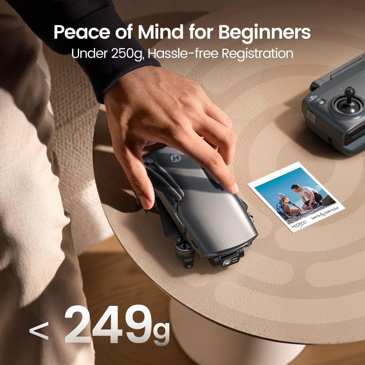 Under-249g foldable drone shown in hand for portable travel use