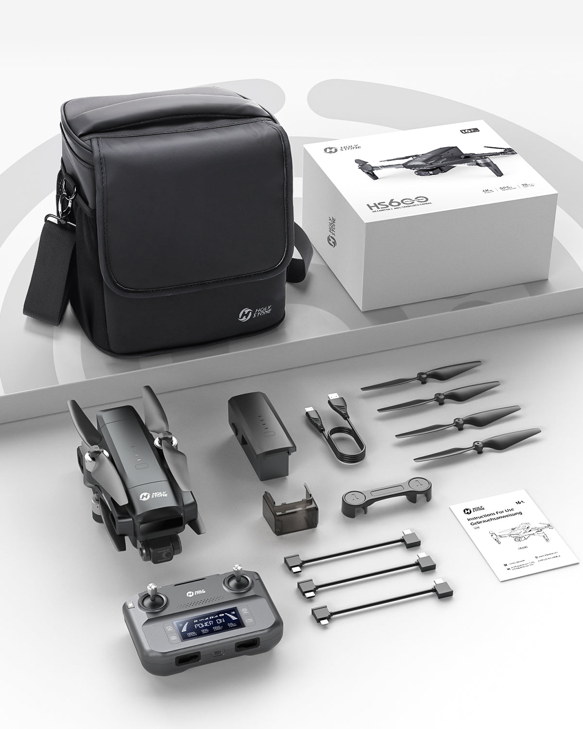 GPS drone package with controller, battery, propellers, cables and accessories
